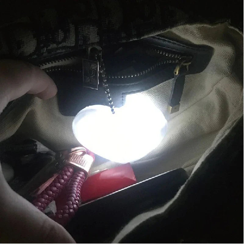 Heart-Shaped LED Purse Light – Automatic Sensor Handbag Light