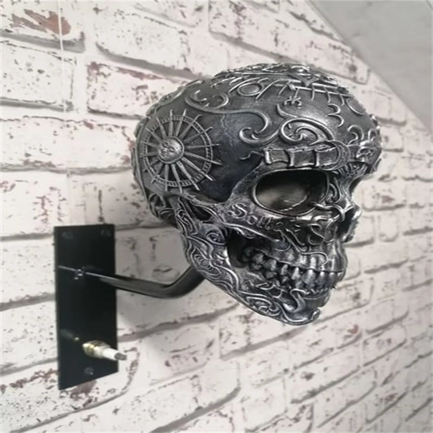 Motorcycle helmet and jacket skull holder